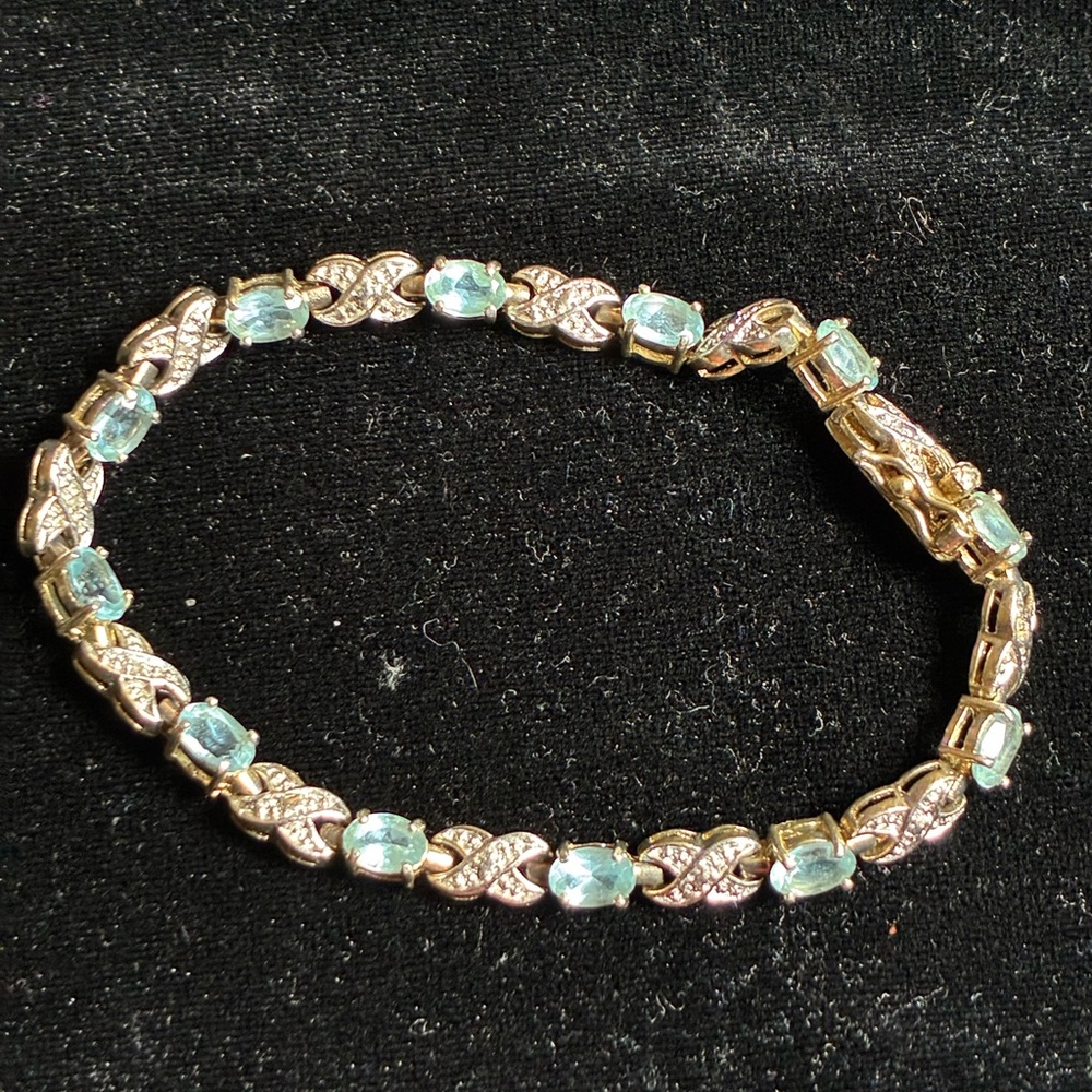 Gold Over 925 Sterling Silver Blue Topaz & Diamond Accent "XO" Tennis Bracelet